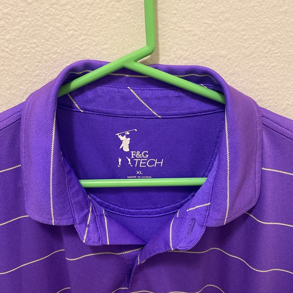 F&G Tech golf shirt.